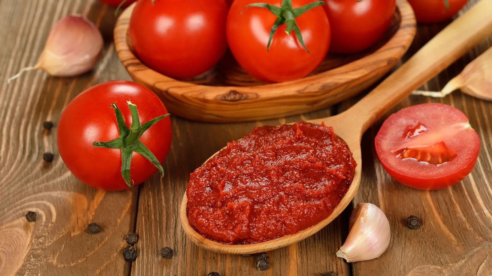 Premium double concentrated tomato paste with rich flavor and thick texture, perfect for cooking and enhancing your recipes naturally.
